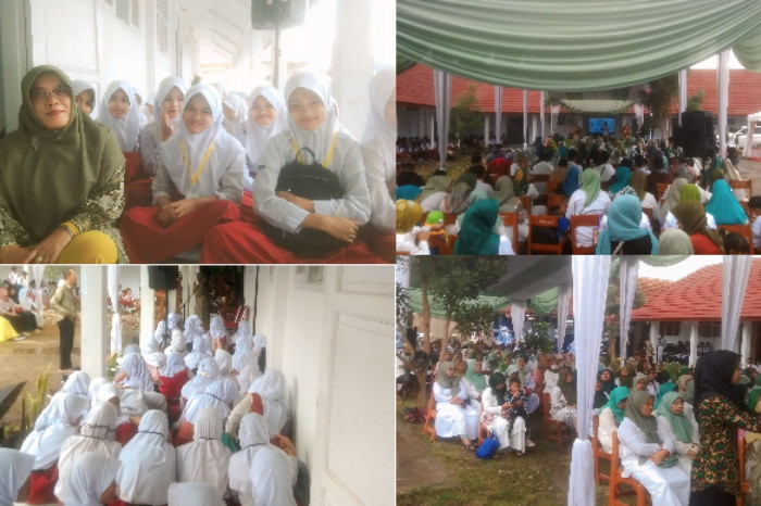 Dr Cucu Suhartini ( kiri atas ) bersama para siswi baru pada acara MPLS SMP Negeri 4 Jatinangor ( Dok.Hariansumedang.com / Tang )