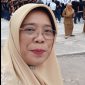 Di balik keteguhan karakter SMPN 4 Jatinangor, ada sosok pemimpin yang menjadi motor penggeraknya: Dr. Hj. Cucu Suhartini, M.Hum.